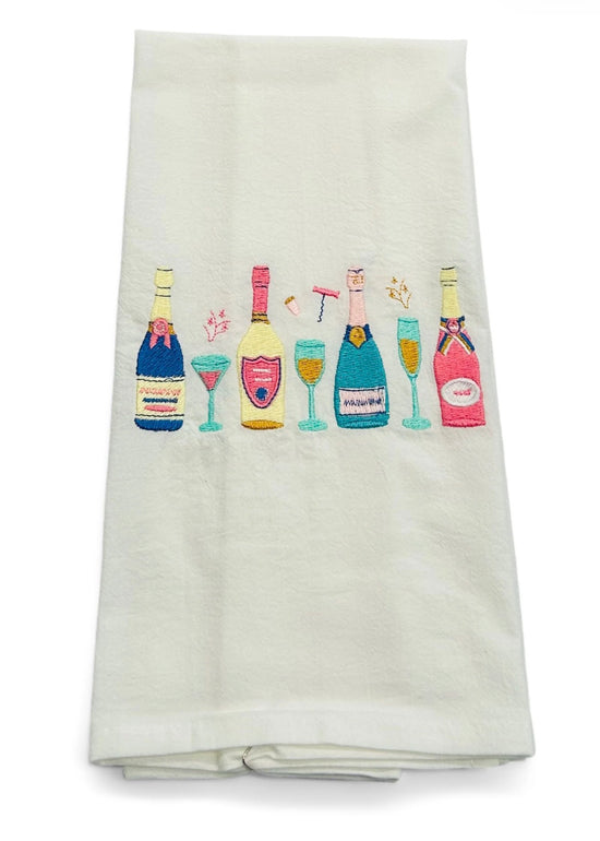Row of Champagne Bottles on White